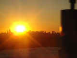 Sunset over Manhattan, as seen from the Throg's Neck Bridge.